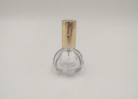 Bottiglia di vetro dello spruzzo del profumo dorato della pompa rotonda con la stampa su misura del logos